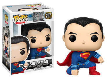 A Funko Pop vinyl figure of Superman in a blue and red costume, poseable with a 'Justice League' backdrop, packaged in a window display box.
