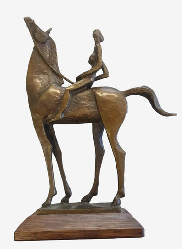 Dalí-inspired surrealist horse rider cast metal sculpture on wooden base