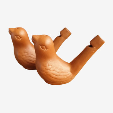 Pair of vintage terracotta bird whistles in unglazed clay, moulded bird form, 7cm long.