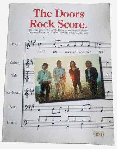 The Doors Rock Score 1995 guitar tab songbook featuring Riders on the Storm and Light My Fire