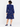 Back view of Trollied Dolly navy swallows print retro dress on female model, showing fitted waist, back zip and flared skirt