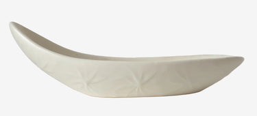 Unicorn England mid century ceramic trough dish with raised starburst pattern in off-white glaze