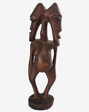 Vintage African hand-carved double-headed wooden figure front view
