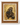 Vintage framed oil painting of a mother and baby baboon in warm earthy tones