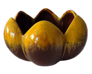 Vintage Blue Mountain Pottery lotus bowl with amber yellow and dark brown dripping glaze