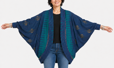 Vintage blue and turquoise batwing-style jacket with ribbed trim, fitted cuffs and handwoven ikat-style fabric.