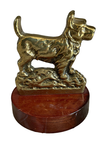 Vintage brass Scottish Terrier dog ornament on wooden base