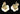 Vintage Denton bone china rose earrings in yellow with screw-back fittings, England. Planet Retro NZ.