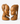 A pair of hand-carved wooden sculptures depicting two female busts facing each other, set against a plain light gray background.