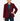 A woman modeling a tailored blazer in deep burgundy, worn over a teal top with dark blue jeans and burgundy heels, photographed against a clean white studio background.