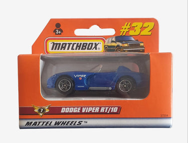 Toy car in packaging with 'Matchbox' branding on a white surface.