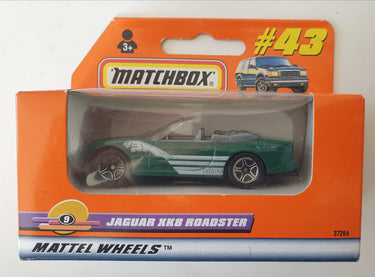 Matchbox Jaguar XK8 Roadster toy car in packaging on a white background