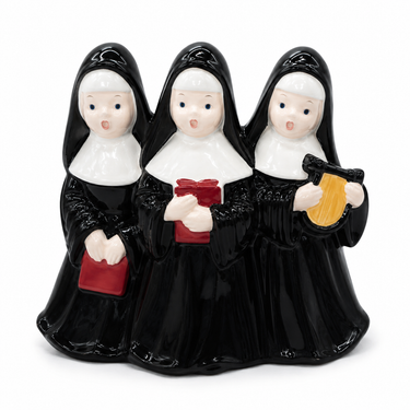 Vintage ceramic figurine of three singing nuns holding hymn books and a lute