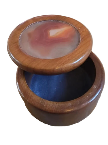 Vintage wooden agate trinket box shown open with blue felt lining