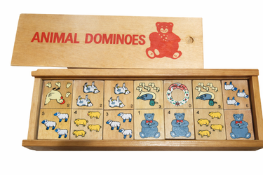 Wooden animal dominoes set with 'Animal Dominoes' packaging on a white background