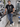 Male model wearing black X Files T-shirt in a science laboratory
