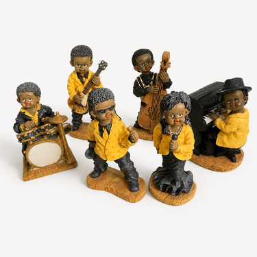 Seven-piece yellow and black jazz band musician figurine set
