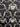 Zombie Love black cotton fabric with skeleton hands forming hearts by Emily Taylor for Riley Blake