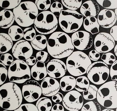 Nightmare Before Christmas Packed Jack black and white Skellington fabric overall print