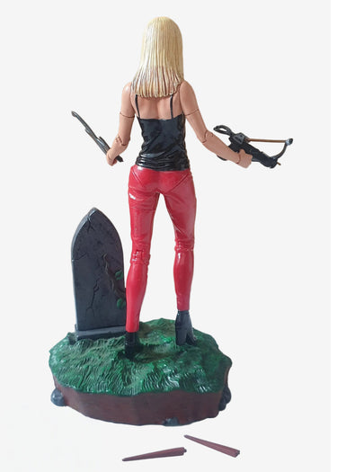 Buffy Summers action figure from Buffy the Vampire Slayer, sold out of original packaging, showing the exact figure and accessories included
