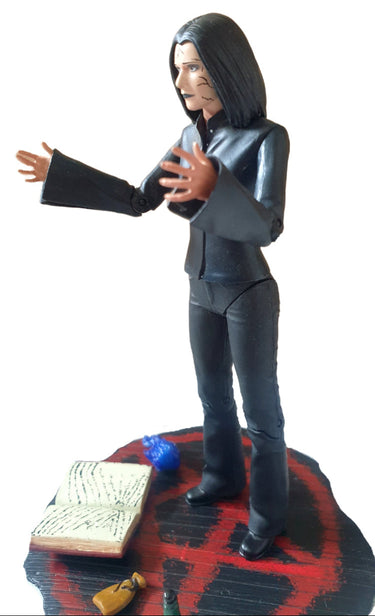 Dark Willow action figure from Buffy the Vampire Slayer, sold loose and without original packaging, showing the exact figure and accessories included