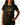 Woman wearing a black t-shirt with a graphic design of wolves and a bear on a white background