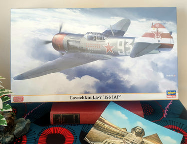 Model airplane box with Lavochkin La-7 '156 IAP' on a colorful surface