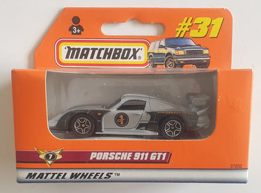 Matchbox Porsche 911 GT1 toy car in packaging on a white background