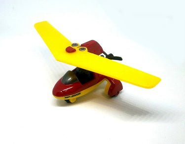 Toy airplane with yellow wings and red body on a white background
