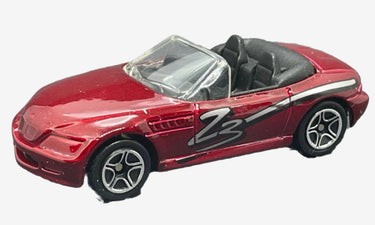 Red convertible toy car with 'Z3' branding on a white background