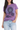 Woman wearing a purple t-shirt with a graphic design, standing against a white background