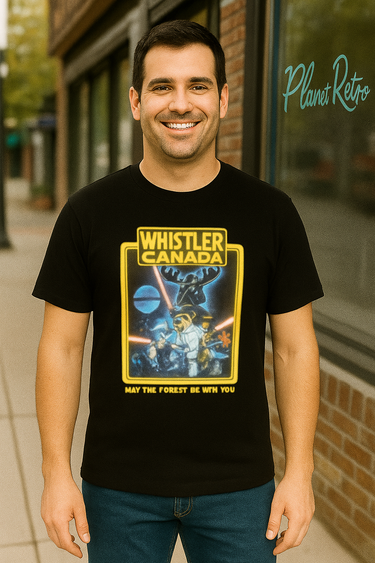 Man wearing a black t-shirt with a graphic design and text, standing in front of a store.