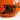 Close-up of a glossy orange enamel bowl featuring a black printed cannon graphic and partial text on a white background.