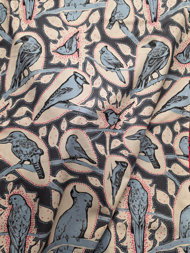 Close-up view of Cacophony Charcoal cotton fabric from Anna Maria Horner's Sweet Dreams range