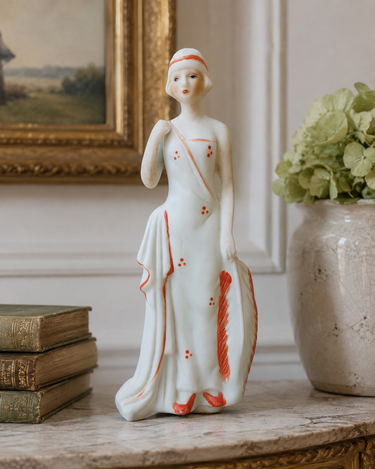 Art Deco style bisque lady figurine with hand painted details, mid-20th century decorative ceramic from Planet Retro NZ.