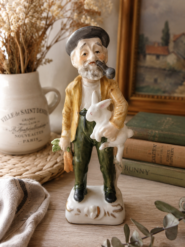 Vintage Ucago Japan Ceramic Farmer with Rabbit Figurine