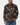 Black floral long sleeved mens shirt with rust, cream and beige rose print, shown on a male model with jeans.