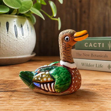 Casals Peru mini clay duck figurine styled in a warm interior