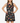 Woman wearing a sleeveless dress with heart and symbol pattern on a plain background