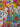 Close-up of Día de los Muertos Fiesta cushion cover fabric and colourful skeleton print