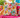 Día de los Muertos Fiesta handmade cushion cover styled in a colourful interior