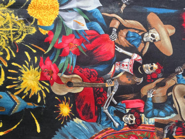 Close-up of Día de los Muertos Village Black cushion cover skeleton musicians and flowers