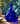 Erik Höglund attributed cobalt blue face bottle displayed against a teal wall in dappled light