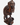 A hand-carved dark wood monkey figurine standing on a small base, photographed against a plain white background.