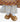 Close-up of gold velvet gown and patterned underskirt on Historic Royal Palaces Queen Teddy Bear