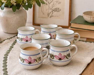 Set of six vintage Iden Pottery mugs with pink floral pattern and blue band detail