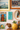 Collection of decorative items including a pineapple, kiwi bird figurine, and framed pictures on a wall.