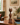 Mid-century wooden cat sculpture with a sleek carved shape and retro decorative style.
