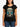 Woman wearing a black t-shirt with a graphic design on a white background