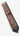 Christmas-themed tie with red and green pattern on a white fabric background